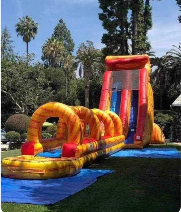 Orange and yellow slip and slide waterslide